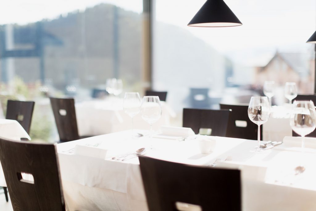 Covered tables in the restaurant of the Hotel Schgaguler